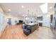 Spacious open floor plan featuring wood floors and contemporary kitchen island at 171 Echols Bnd, Hiram, GA 30141
