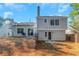 Spacious backyard with a small patio perfect for outdoor entertaining and relaxation at 3268 Rivermist Cv, Decatur, GA 30034