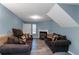 Inviting living room with a fireplace, comfortable couches, and updated flooring for relaxing and entertaining at 3268 Rivermist Cv, Decatur, GA 30034