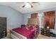 Bedroom features a large bed, vaulted ceiling and large windows with natural light at 3268 Rivermist Cv, Decatur, GA 30034