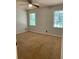 This bedroom has neutral colored walls, a ceiling fan and carpeted floors at 2921 Oakwilde Ct, Snellville, GA 30039