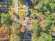 An aerial view of the home surrounded by beautiful trees and well-maintained lawns at 1403 Centra Villa Dr, Atlanta, GA 30311