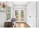 Cozy hallway leading to an outdoor deck offering natural light and stylish decor at 1403 Centra Villa Dr, Atlanta, GA 30311