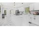 Modern kitchen with white cabinetry, island, and stainless steel appliances at 1403 Centra Villa Dr, Atlanta, GA 30311