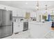 Spacious kitchen with stainless steel appliances, white cabinets, and island at 1403 Centra Villa Dr, Atlanta, GA 30311