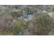 A beautiful aerial view of the community clubhouse, pool and tennis courts at 310 Mulberry Manor Ct, Johns Creek, GA 30005