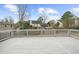Large deck perfect for outdoor entertaining, with a view of the spacious backyard at 310 Mulberry Manor Ct, Johns Creek, GA 30005
