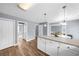 Spacious eat-in kitchen with modern wood flooring and beautiful natural light at 310 Mulberry Manor Ct, Johns Creek, GA 30005