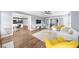 Bright open-concept living area offering flexible layout with hardwood floors at 310 Mulberry Manor Ct, Johns Creek, GA 30005