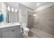 Bathroom with a glass-enclosed shower, modern vanity, and stylish tile work at 145 Canton St, Alpharetta, GA 30009