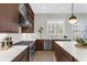 Modern kitchen featuring stainless steel appliances, island, and bright natural light at 145 Canton St, Alpharetta, GA 30009