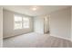 Carpeted bedroom featuring neutral walls and bright natural light at 1730 Fulmont Cir, Mableton, GA 30126