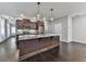 Open kitchen featuring stainless appliances, wooden cabinets and a center island with a sink at 1020 Broadview Dr, Marietta, GA 30062