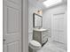 Bathroom with decorative vanity, new toilet, and closet at 3636 Peachtree Ne Rd # 405, Atlanta, GA 30319