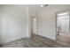 Bedroom features hardwood flooring and natural light from window at 3636 Peachtree Ne Rd # 405, Atlanta, GA 30319