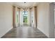 Bright dining room with a decorative chandelier and beautiful bay window at 3636 Peachtree Ne Rd # 405, Atlanta, GA 30319