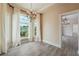 Dining room features a decorative chandelier and large window for natural light at 3636 Peachtree Ne Rd # 405, Atlanta, GA 30319