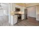 Kitchen area boasts stainless steel appliances and an open view to other rooms at 3636 Peachtree Ne Rd # 405, Atlanta, GA 30319