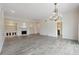 Inviting living room with hardwood floors, fireplace, and built-in shelving at 3636 Peachtree Ne Rd # 405, Atlanta, GA 30319
