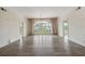 Bright and spacious living room with hardwood floors, natural light, and a chandelier at 3636 Peachtree Ne Rd # 405, Atlanta, GA 30319