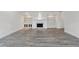 Cozy living room with hardwood floors, fireplace, and built-in shelving at 3636 Peachtree Ne Rd # 405, Atlanta, GA 30319