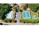 Aerial shot showcases community pool, tennis courts, and basketball court at 5148 Centennial Creek Nw Vw, Acworth, GA 30102