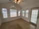 Inviting sunroom with vaulted ceiling, ceiling fan, and views of the outdoors at 5148 Centennial Creek Nw Vw, Acworth, GA 30102