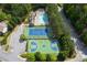 An aerial view of community pool, basketball court, and tennis court at 6158 Brookmere Pl, Mableton, GA 30126