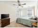 Bedroom with a ceiling fan, carpet, and large windows at 6158 Brookmere Pl, Mableton, GA 30126