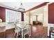 Dining area with hardwood floors, chandelier and lots of natural light at 6158 Brookmere Pl, Mableton, GA 30126