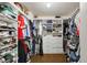 Large walk-in closet with built-in shelving and organization system at 6158 Brookmere Pl, Mableton, GA 30126