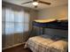 Bedroom featuring bunkbeds, hardwood floors, and ample natural light at 687 N Hairston Rd, Stone Mountain, GA 30083