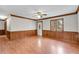 Living room featuring laminate flooring and wood trim at 881 Brighton Dr, Lawrenceville, GA 30043