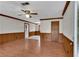 Spacious living room with wood trim, ceiling fan, and hardwood flooring at 881 Brighton Dr, Lawrenceville, GA 30043