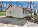 Single-story home's rear entrance and driveway at 881 Brighton Dr, Lawrenceville, GA 30043