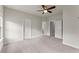 Spacious bedroom featuring neutral paint, carpeted floor, and ceiling fan at 1286 Brookins Trl, Atlanta, GA 30316