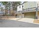 Exterior view of townhomes with garage parking and balconies at 1286 Brookins Trl, Atlanta, GA 30316