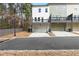 View of modern townhome exterior with garage and deck at 1286 Brookins Trl, Atlanta, GA 30316