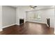 Cozy living room with a fireplace and hardwood flooring at 1286 Brookins Trl, Atlanta, GA 30316