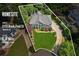 Aerial view of a homesite, house and lot at 2115 Brook Pond Ct, lot size 0.30 acres at 2115 Brook Pond Ct, Alpharetta, GA 30005