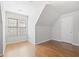 Bedroom featuring hardwood floors, neutral paint, and window with blinds at 1102 White Cloud Rdg, Snellville, GA 30078