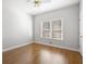 Bedroom featuring hardwood floors, neutral paint and ample light at 1102 White Cloud Rdg, Snellville, GA 30078