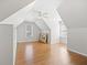 Bedroom featuring neutral paint, hardwood floors, natural light, and a ceiling fan at 1102 White Cloud Rdg, Snellville, GA 30078