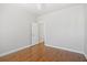 Bright bedroom features pristine walls, hardwood floors, and a ceiling fan at 1102 White Cloud Rdg, Snellville, GA 30078