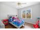 bedroom featuring hardwood floors, natural light, and a ceiling fan at 1102 White Cloud Rdg, Snellville, GA 30078