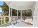 Spacious outdoor deck with white railings and a ceiling fan overlooking the backyard at 1102 White Cloud Rdg, Snellville, GA 30078