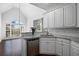 Bright kitchen with stainless steel dishwasher and granite countertops at 1102 White Cloud Rdg, Snellville, GA 30078