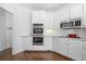 Well-equipped kitchen featuring stainless steel appliances and granite countertops at 1102 White Cloud Rdg, Snellville, GA 30078