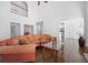 Open-concept living room with hardwood floors and neutral colored decor at 1102 White Cloud Rdg, Snellville, GA 30078