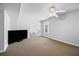Spacious room with neutral carpet and a large television at 1102 White Cloud Rdg, Snellville, GA 30078